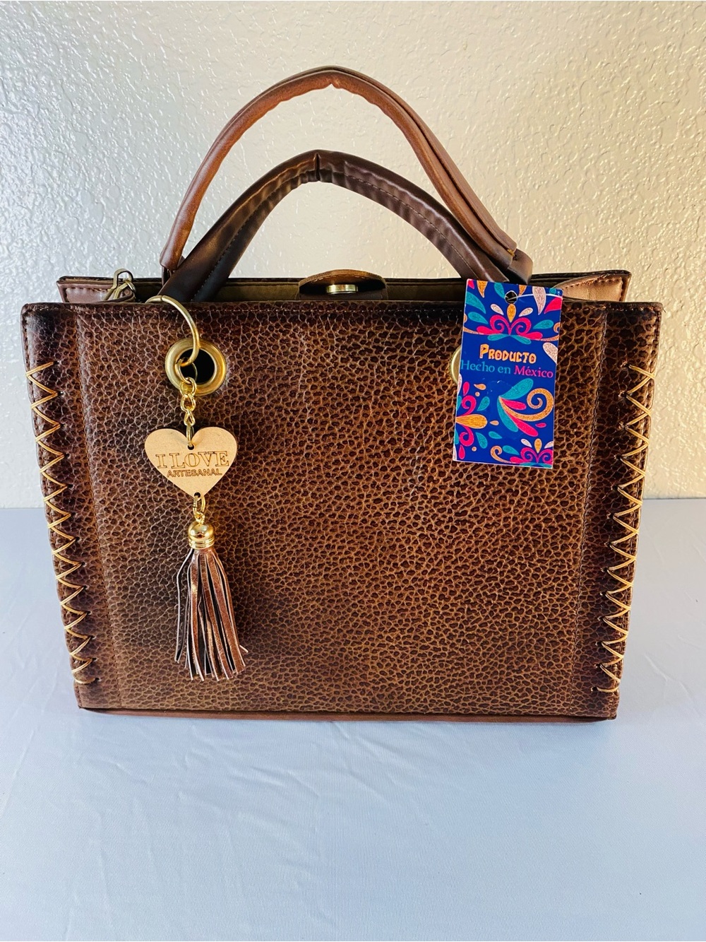 Artisanal Brown Leather Satchel with Tassel Charm